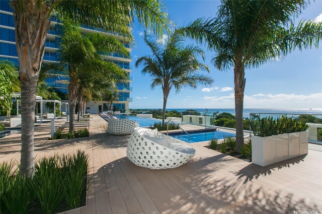 1118 Ala Moana Blvd Unit 2, Honolulu, HI 96814 - community pool featuring a deck with water view