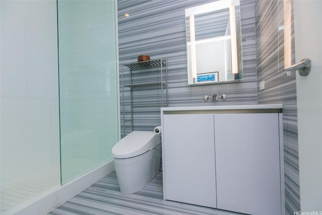 1118 Ala Moana Blvd Unit 2, Honolulu, HI 96814 - full bathroom featuring vanity, toilet, tile walls, and a tile shower