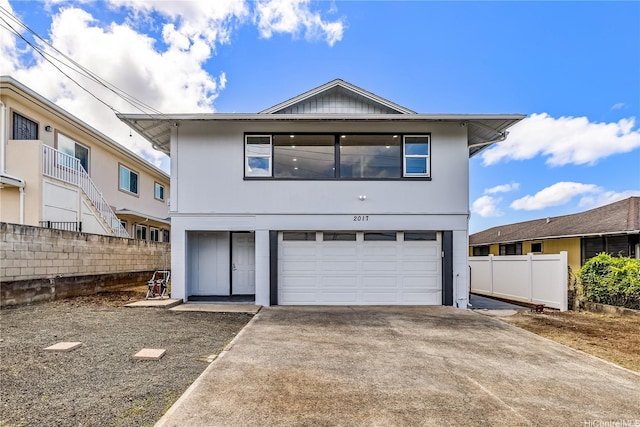 2017 Liliha St, Honolulu, HI 96817 - view of front of home featuring an attached garage and concrete driveway