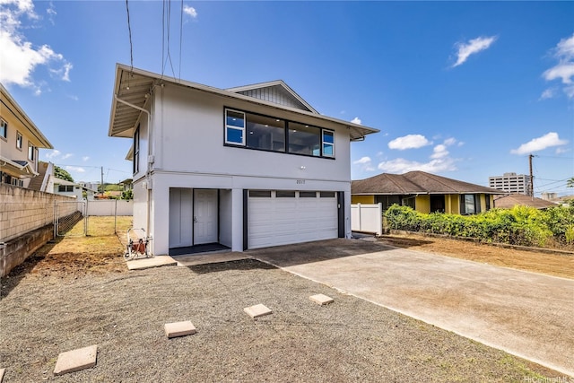 2017 Liliha St, Honolulu, HI 96817 - view of front of property with concrete driveway and a garage