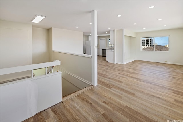 2017 Liliha St, Honolulu, HI 96817 - hallway featuring an upstairs landing, light wood finished floors, baseboards, and recessed lighting