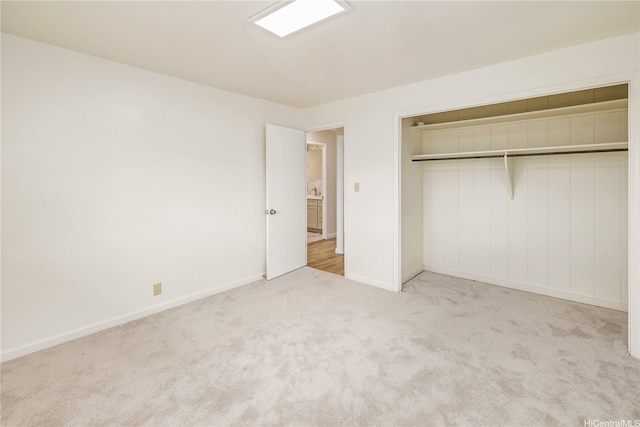 2017 Liliha St, Honolulu, HI 96817 - unfurnished bedroom featuring carpet, baseboards, and a closet