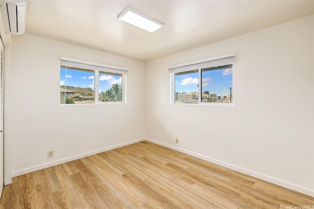 2017 Liliha St, Honolulu, HI 96817 - unfurnished room with light wood finished floors and baseboards