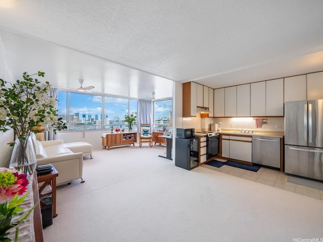 1545 Nehoa St Unit 402, Honolulu, HI 96822 - living room featuring a view of city, light colored carpet, and a textured ceiling