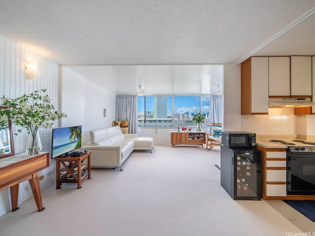 1545 Nehoa St Unit 402, Honolulu, HI 96822 - living room with light colored carpet, beverage cooler, and a textured ceiling