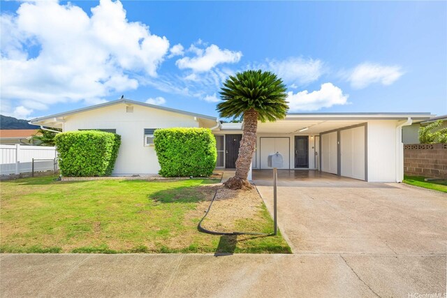 252 Anapalau St, Honolulu, HI 96825 - view of front of home with concrete driveway and a carport