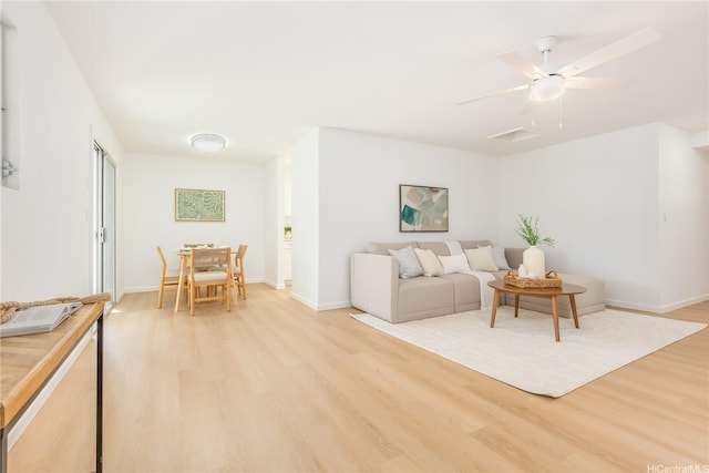 252 Anapalau St, Honolulu, HI 96825 - living room featuring light wood-style flooring, baseboards, and ceiling fan