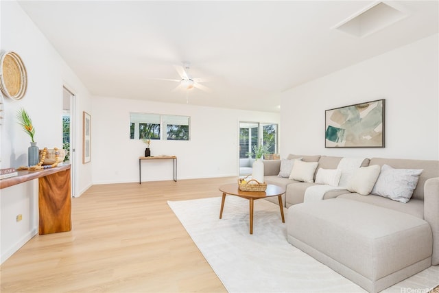 252 Anapalau St, Honolulu, HI 96825 - living room featuring light wood-type flooring, ceiling fan, and baseboards