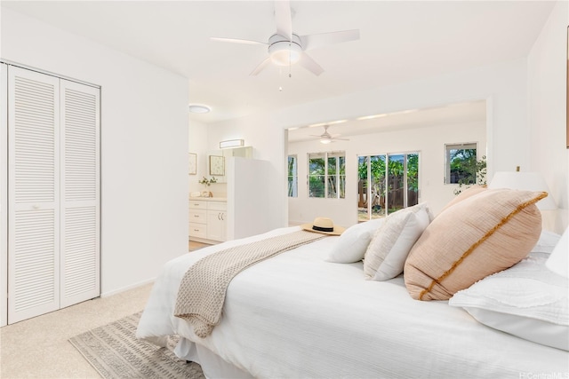 252 Anapalau St, Honolulu, HI 96825 - bedroom with light colored carpet, ceiling fan, ensuite bathroom, and a closet