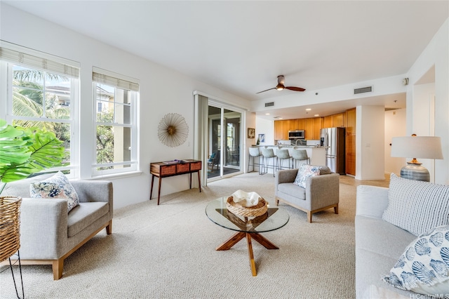 520 Lunalilo Home Rd Unit 7217, Honolulu, HI 96825 - living area featuring a ceiling fan and light colored carpet