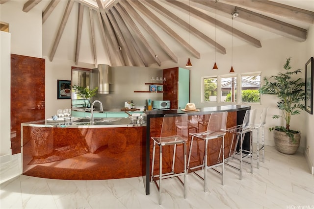 4745 Aukai Ave, Honolulu, HI 96816 - kitchen featuring light marble finish floors, beam ceiling, a breakfast bar area, high vaulted ceiling, and hanging light fixtures