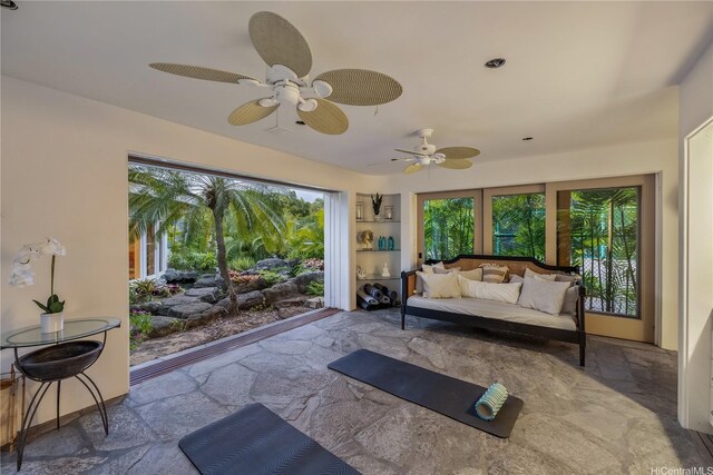 4745 Aukai Ave, Honolulu, HI 96816 - living area featuring stone tile floors and a ceiling fan