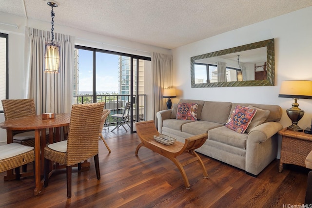 2140 Kuhio Ave Unit 1103, Nuc Honolulu, HI 96815 - living area with wood finished floors and a textured ceiling