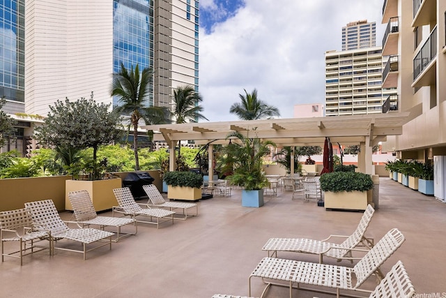 2140 Kuhio Ave Unit 1103, Nuc Honolulu, HI 96815 - view of patio featuring a pergola