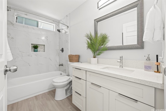 95-1015 Kaapeha St Unit 64, Mililani, HI 96789 - full bath with vanity, wood finished floors, bathing tub / shower combination, and toilet