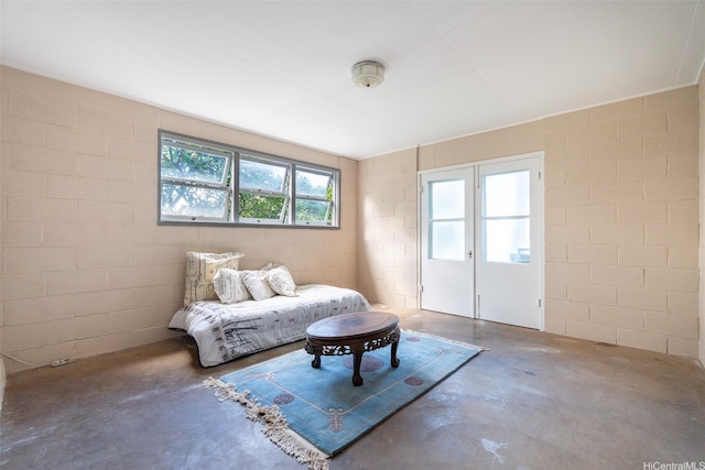 3726 Manini Way, Honolulu, HI 96816 - living area featuring concrete floors and concrete block wall