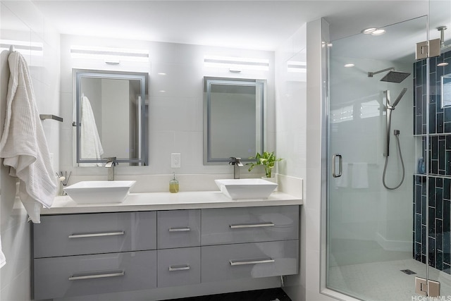 2638 Nakookoo St Unit 501, Honolulu, HI 96826 - bathroom featuring a shower stall and double vanity