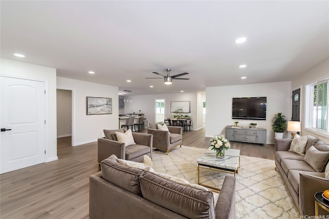 839 Oneawa St, Kailua, HI 96734 - living area with healthy amount of natural light, ceiling fan, light wood-style floors, recessed lighting, and baseboards