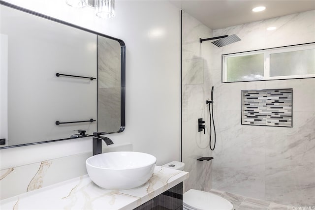 839 Oneawa St, Kailua, HI 96734 - bathroom with vanity, a tile shower, and toilet