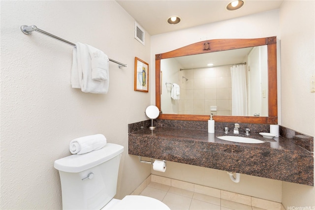 2045 Kalakaua Ave Unit 604, Honolulu, HI 96815 - bathroom with a sink, toilet, a shower with shower curtain, and tile patterned flooring