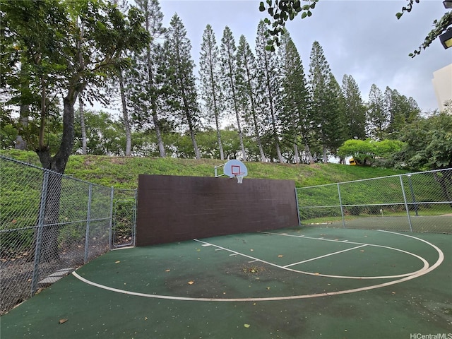 view of sport court featuring basketball hoop