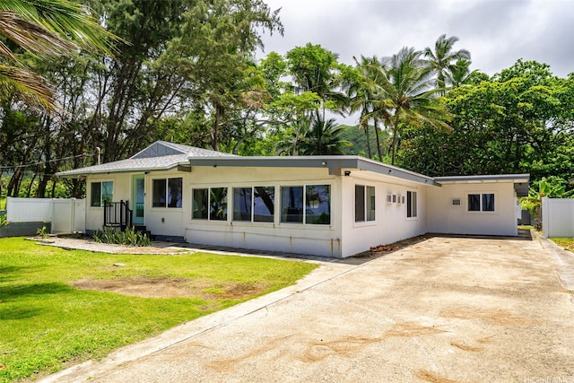 54-100 Kamehameha Hwy, Hauula, HI 96717 - view of front of home with concrete driveway and stucco siding