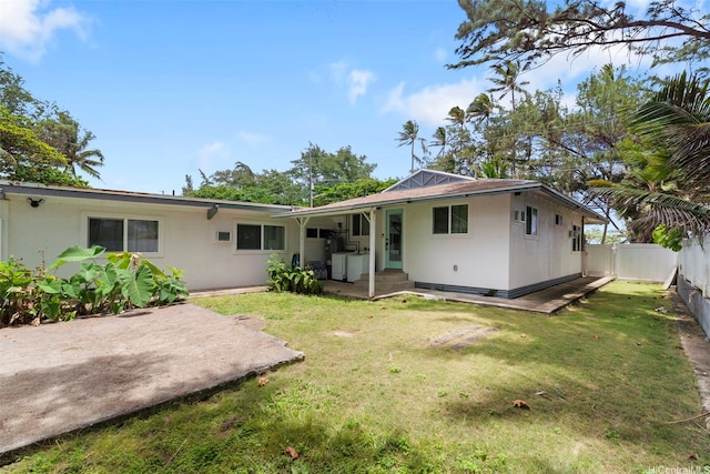 54-100 Kamehameha Hwy, Hauula, HI 96717 - back of house with a patio area and stucco siding