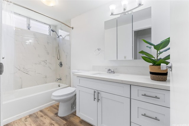 98-597 Kilinoe St Unit 10A1, Aiea, HI 96701 - bathroom featuring vanity,  shower combination, wood finished floors, and toilet