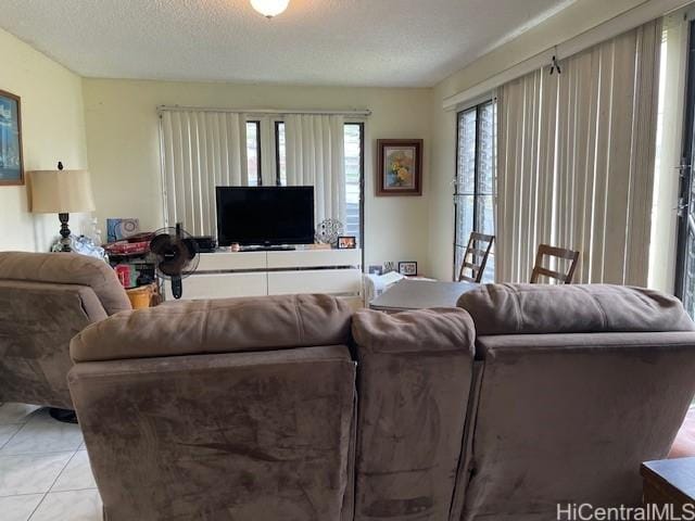 47-166 Wailehua Rd, Kaneohe, HI 96744 - living room with a textured ceiling and light tile patterned floors
