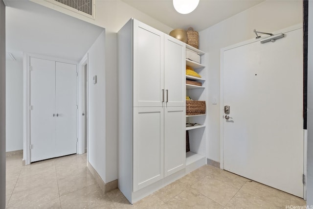 999 Wilder Ave Unit 1603, Honolulu, HI 96822 - hall with light tile patterned floors and baseboards