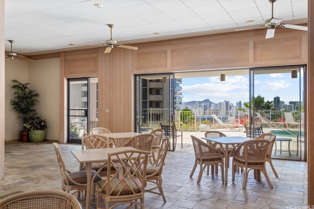 999 Wilder Ave Unit 1603, Honolulu, HI 96822 - dining room featuring ceiling fan and a skyline view
