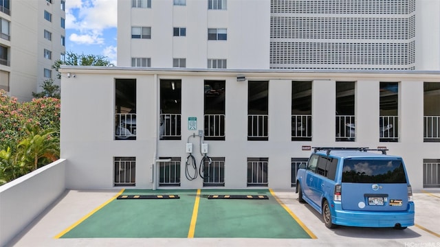 999 Wilder Ave Unit 1603, Honolulu, HI 96822 - view of building exterior with uncovered parking