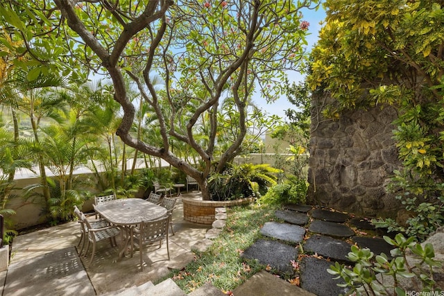 999 Wilder Ave Unit 1603, Honolulu, HI 96822 - view of patio with outdoor dining area