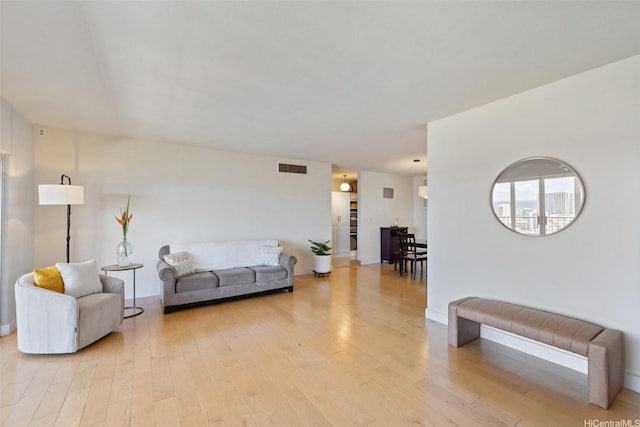 999 Wilder Ave Unit 1603, Honolulu, HI 96822 - living area featuring light wood-style floors