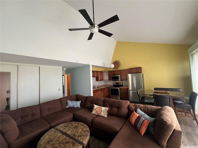 84-754 Ala Mahiku St Unit 1145C, Waianae, HI 96792 - living area with high vaulted ceiling, wood finished floors, and a ceiling fan