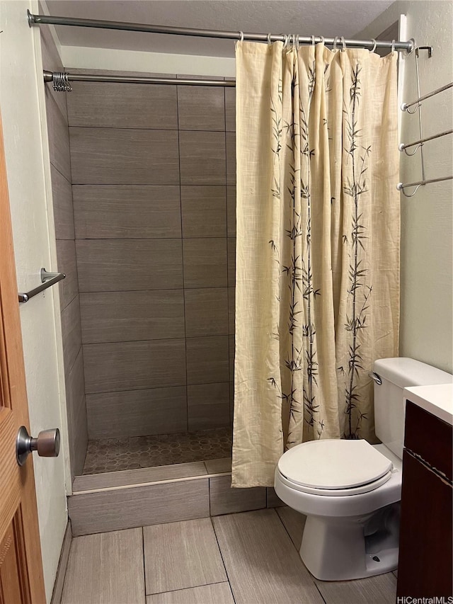 84-754 Ala Mahiku St Unit 1145C, Waianae, HI 96792 - bathroom featuring toilet, vanity, and a tile shower