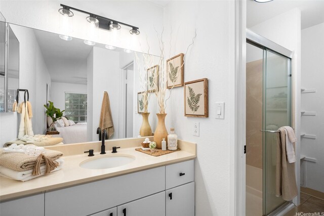 306 Mananai Pl Unit 4D, Honolulu, HI 96818 - bathroom featuring vanity and a stall shower
