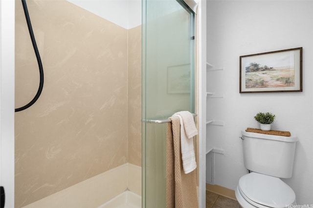 306 Mananai Pl Unit 4D, Honolulu, HI 96818 - bathroom with a shower stall, toilet, and tile patterned floors