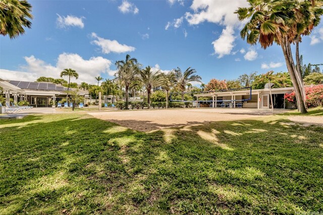 306 Mananai Pl Unit 4D, Honolulu, HI 96818 - view of property's community featuring a yard and volleyball court