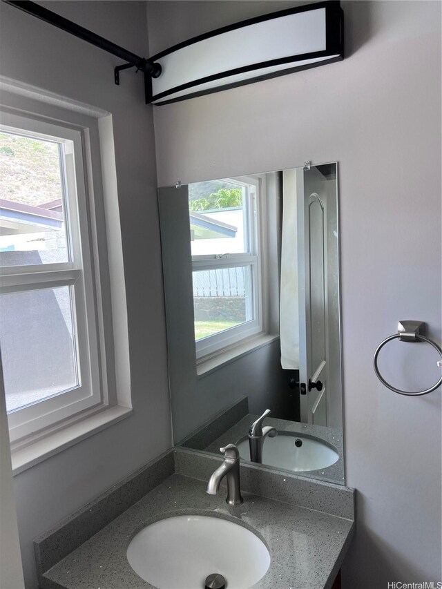 612 Ainapo St, Honolulu, HI 96825 - bathroom featuring healthy amount of natural light and vanity