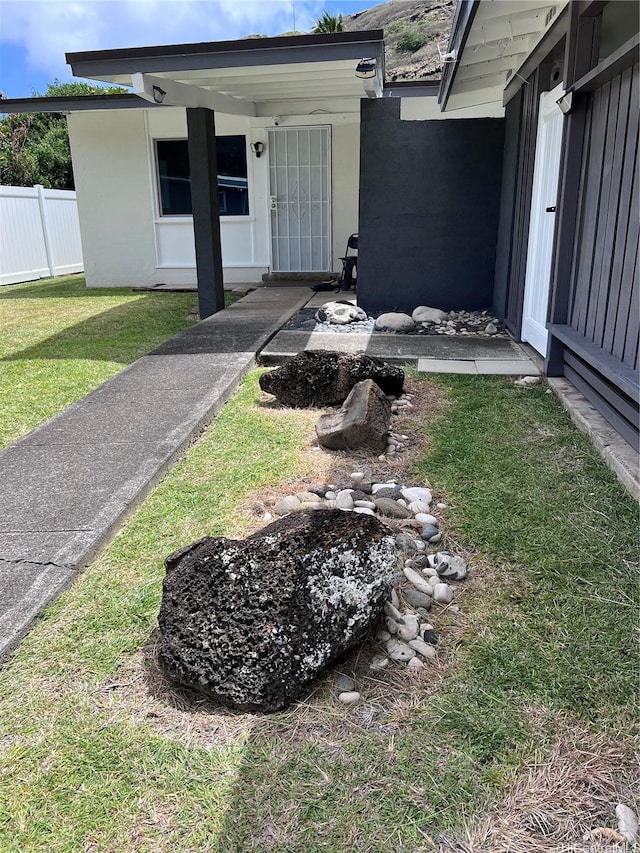 612 Ainapo St, Honolulu, HI 96825 - property entrance with stucco siding