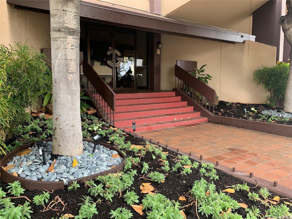 320 Liliuokalani Ave Unit 605, Honolulu, HI 96815 - doorway to property with stucco siding
