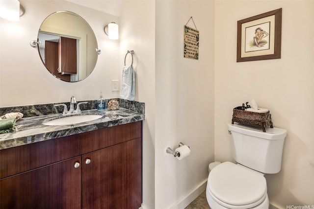 440 Akoakoa Pl, Kailua, HI 96734 - half bathroom featuring vanity, toilet, and baseboards