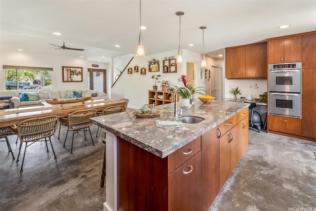 440 Akoakoa Pl, Kailua, HI 96734 - kitchen with a sink, stainless steel double oven, recessed lighting, concrete flooring, and open floor plan