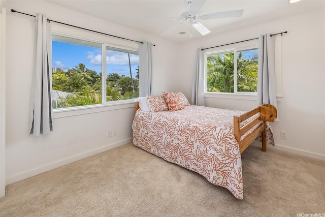 440 Akoakoa Pl, Kailua, HI 96734 - carpeted bedroom with baseboards and a ceiling fan