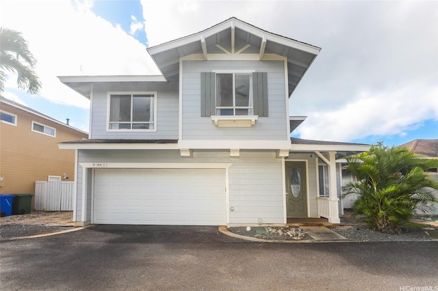 91-1031C Opuku St, Kapolei, HI 96707 - view of front facade with asphalt driveway and a garage
