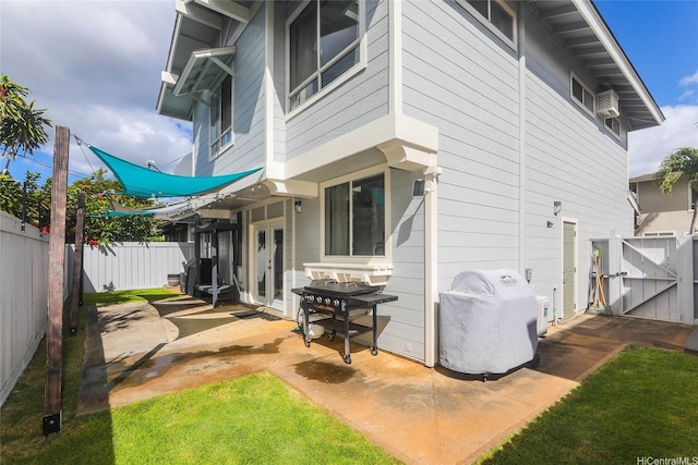 91-1031C Opuku St, Kapolei, HI 96707 - back of house with a gate, a fenced backyard, and a patio area