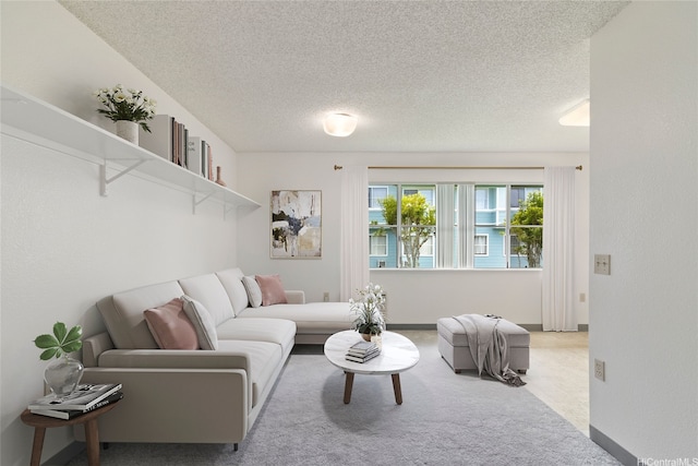 95-1180 Makaikai St Unit 74, Mililani, HI 96789 - living room with carpet flooring, a textured ceiling, and baseboards