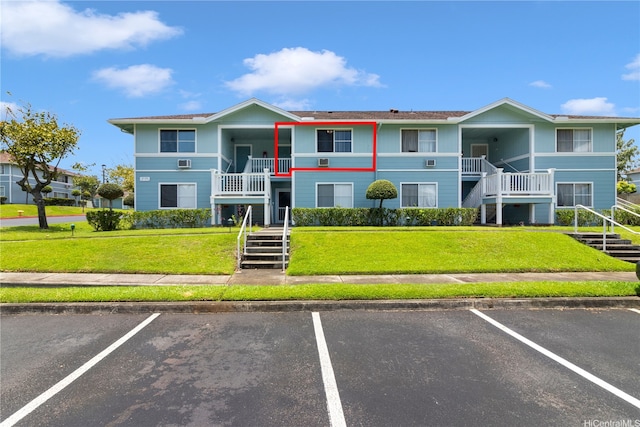 95-1180 Makaikai St Unit 74, Mililani, HI 96789 - view of property with stairs and uncovered parking