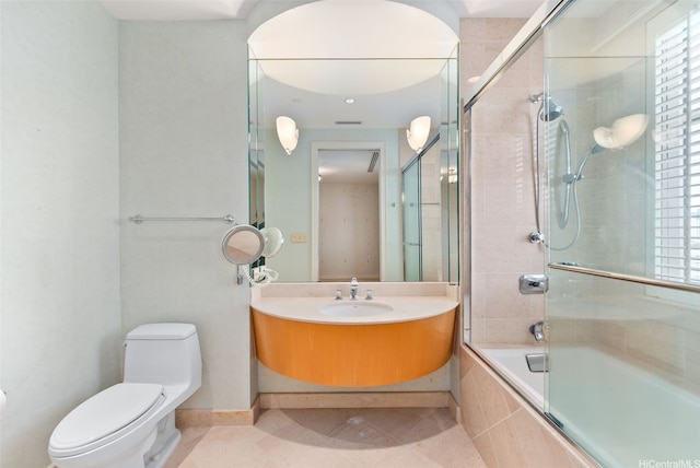 1740 S Beretania St Unit 10, Honolulu, HI 96826 - bathroom with toilet, tiled shower / bath combo, vanity, and tile patterned floors